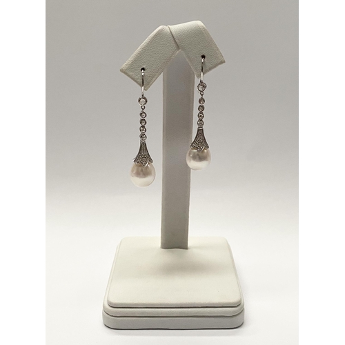 137 - A BEAUTIFUL PAIR OF 18CT WHITE GOLD SOUTH SEA PEARL AND DIAMOND DROP EARRINGS, with five round cut d... 