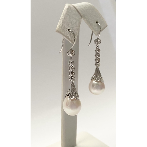 137 - A BEAUTIFUL PAIR OF 18CT WHITE GOLD SOUTH SEA PEARL AND DIAMOND DROP EARRINGS, with five round cut d... 