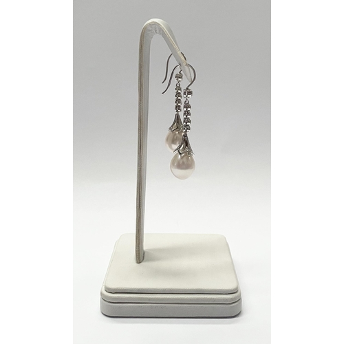 137 - A BEAUTIFUL PAIR OF 18CT WHITE GOLD SOUTH SEA PEARL AND DIAMOND DROP EARRINGS, with five round cut d... 