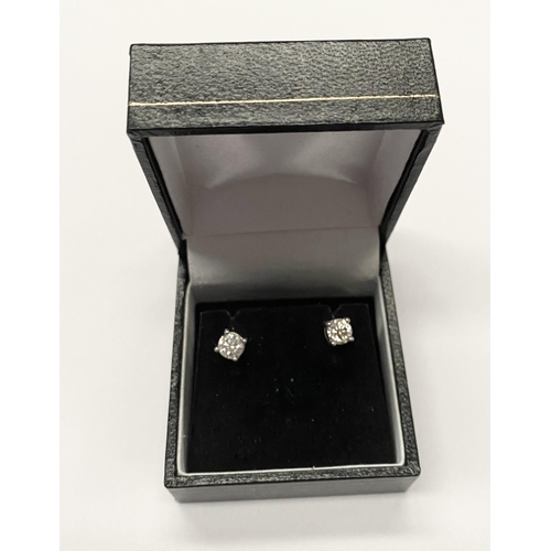 139 - A CLASSIC PAIR OF 18CT WHITE GOLD DIAMOND STUD EARRINGS, brilliant round cut diamonds in four claw 1... 