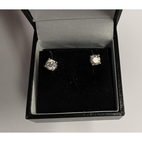 139 - A CLASSIC PAIR OF 18CT WHITE GOLD DIAMOND STUD EARRINGS, brilliant round cut diamonds in four claw 1... 