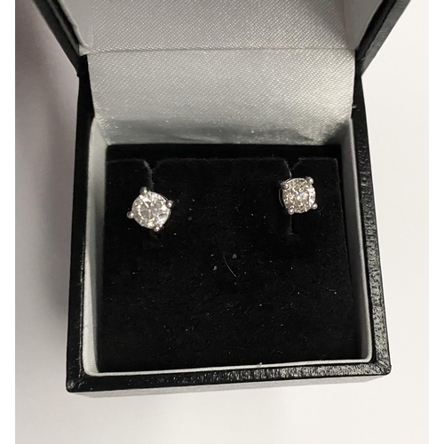 139 - A CLASSIC PAIR OF 18CT WHITE GOLD DIAMOND STUD EARRINGS, brilliant round cut diamonds in four claw 1... 