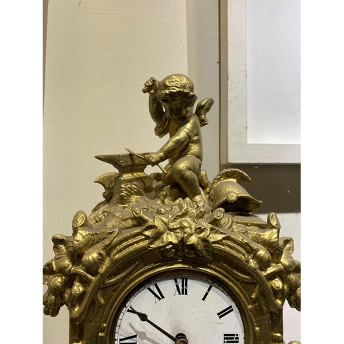 147 - A DECORATIVE VINTAGE FRENCH STYLE GILT MANTLE CLOCK, with roman numerals to dial within highly decor... 