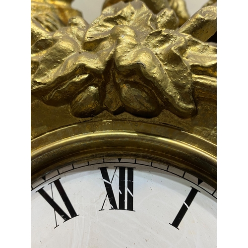 147 - A DECORATIVE VINTAGE FRENCH STYLE GILT MANTLE CLOCK, with roman numerals to dial within highly decor... 