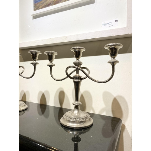 150 - A GOOD PAIR OF VINTAGE SILVER PLATED THREE BRANCH CANDLEABRA, each with two scrolling fluted branche... 