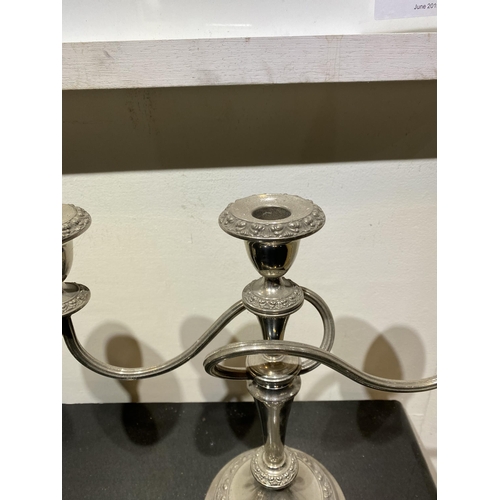 150 - A GOOD PAIR OF VINTAGE SILVER PLATED THREE BRANCH CANDLEABRA, each with two scrolling fluted branche... 