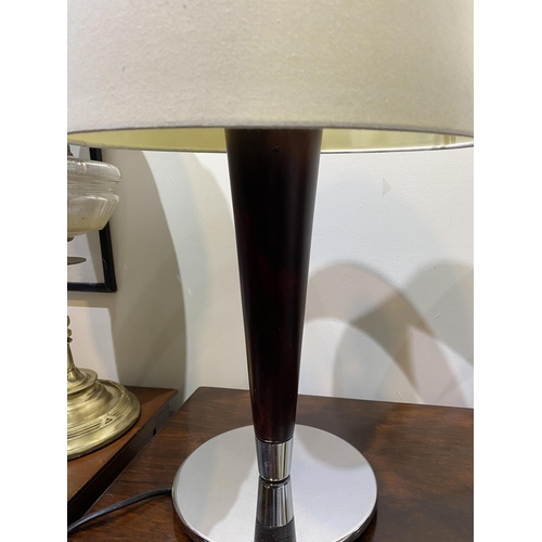 152 - A PAIR OF CHROME AND ROSEWOOD STYLE TABLE LAMPS, with tapered support atop circular base. Dimensions... 