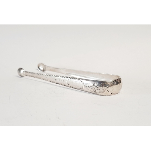 156 - AN 18TH CENTURY SILVER SUGAR TONGS, by the maker John Dalrymple. Circa 1790. Decorated all over with... 