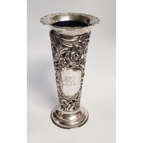 157 - A LATE 19TH CENTURY PAIR OF SILVER BUD VASES, with purple glass liners, each vase decorated all over... 