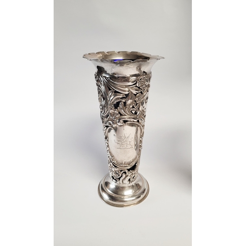 157 - A LATE 19TH CENTURY PAIR OF SILVER BUD VASES, with purple glass liners, each vase decorated all over... 