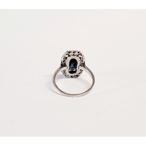 158 - A FRENCH ART DECO SAPPHIRE & DIAMOND CLUSTER RING, with a central dark sapphire surrounded by a fram... 