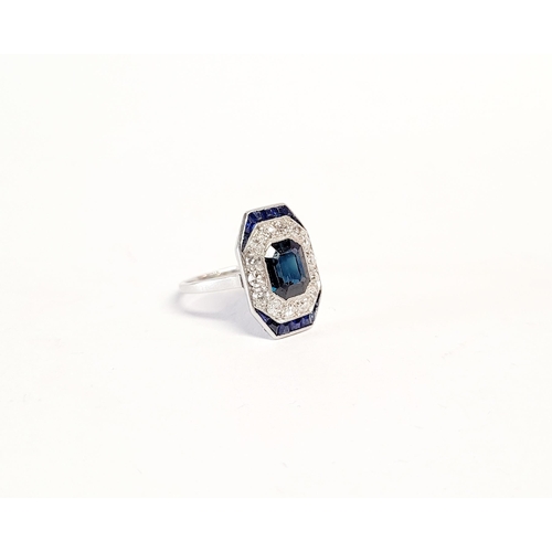 158 - A FRENCH ART DECO SAPPHIRE & DIAMOND CLUSTER RING, with a central dark sapphire surrounded by a fram... 