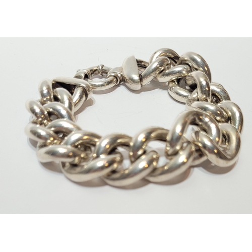 163 - A VERY GOOD QUALITY STERLING SILVER LINK BRACELET, opens to 20.5cm, weight: 2ozt. Marked 925.