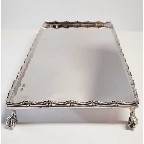 172 - AN IRISH, CORK, SILVER TRAY, with raised gallery edge decorated with scrolling reed detail & star ro... 