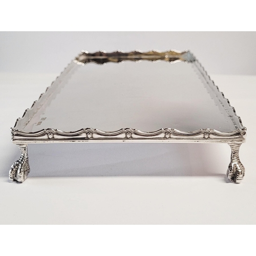 172 - AN IRISH, CORK, SILVER TRAY, with raised gallery edge decorated with scrolling reed detail & star ro... 