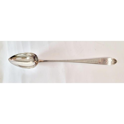 174 - A LARGE IRISH TURN OF 19TH CENTURY SILVER BASTING SPOON, the handle & tip decorated with bright cut ... 