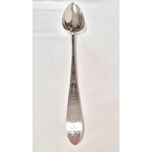 174 - A LARGE IRISH TURN OF 19TH CENTURY SILVER BASTING SPOON, the handle & tip decorated with bright cut ... 