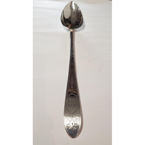 174 - A LARGE IRISH TURN OF 19TH CENTURY SILVER BASTING SPOON, the handle & tip decorated with bright cut ... 