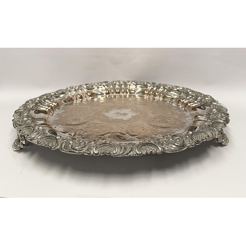 181 - A VERY DECORATIVE SILVER PLATED LARGE SALVER, with engraved cartouche to centre surrounded by engrav... 