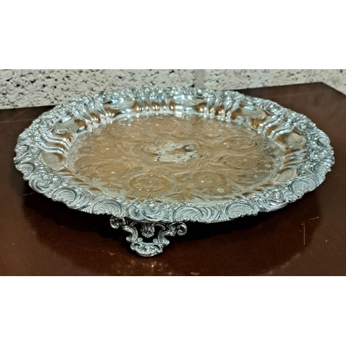 181 - A VERY DECORATIVE SILVER PLATED LARGE SALVER, with engraved cartouche to centre surrounded by engrav... 