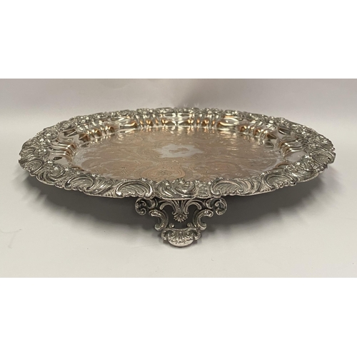 181 - A VERY DECORATIVE SILVER PLATED LARGE SALVER, with engraved cartouche to centre surrounded by engrav... 