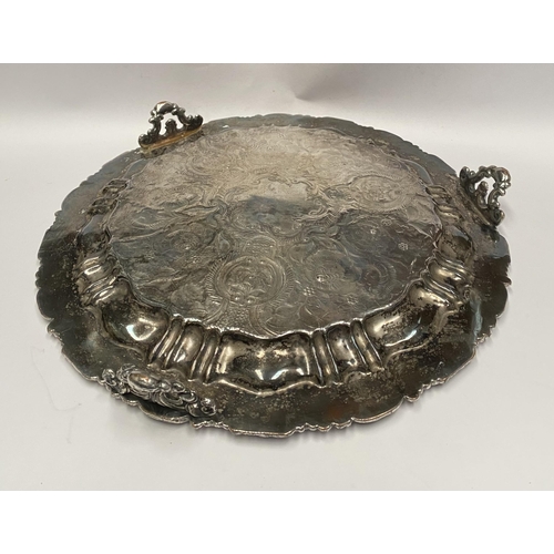 181 - A VERY DECORATIVE SILVER PLATED LARGE SALVER, with engraved cartouche to centre surrounded by engrav... 