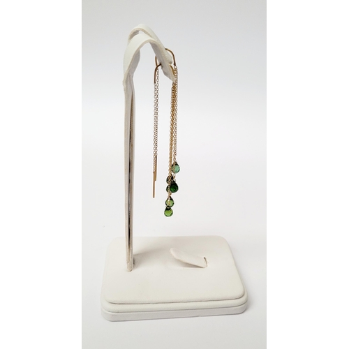 183 - A PRETTY PAIR OF HANGING PERIDOT DROP EARRINGS, each earring with a beautiful trail of peridot stone... 