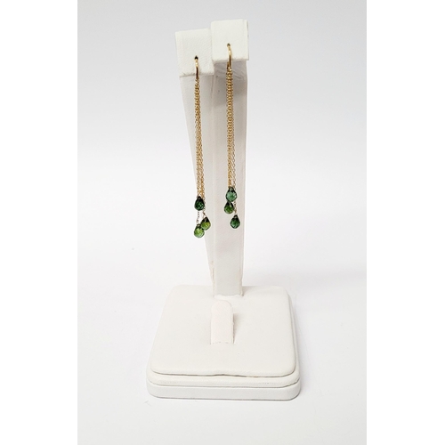 183 - A PRETTY PAIR OF HANGING PERIDOT DROP EARRINGS, each earring with a beautiful trail of peridot stone... 