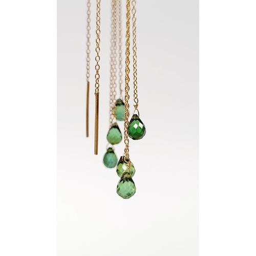 183 - A PRETTY PAIR OF HANGING PERIDOT DROP EARRINGS, each earring with a beautiful trail of peridot stone... 