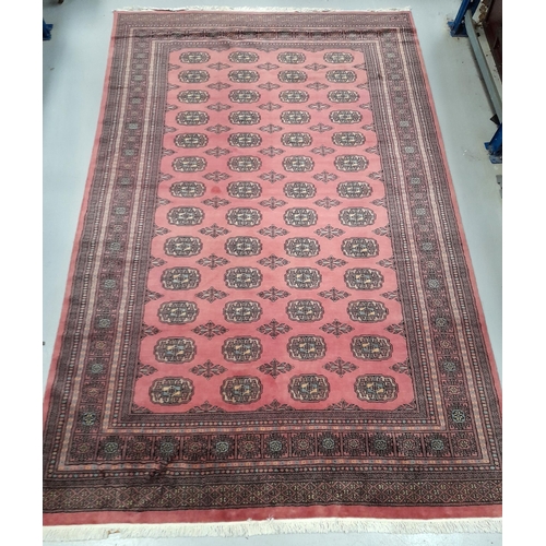 188 - AN EXCELLENT PAKISTAN BOKHARA RUG, hand-woven, featuring tradition Bokhara pattern with central repe... 