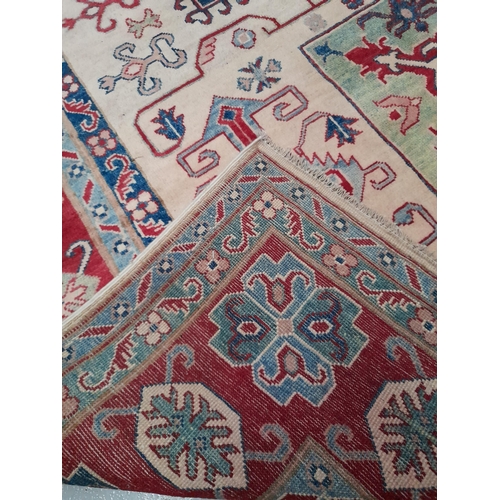 189 - AN EXCELLENT HAND-KNOTTED KAZAK RUG, hand-woven, featuring tradition Kazak pattern with multiple geo... 