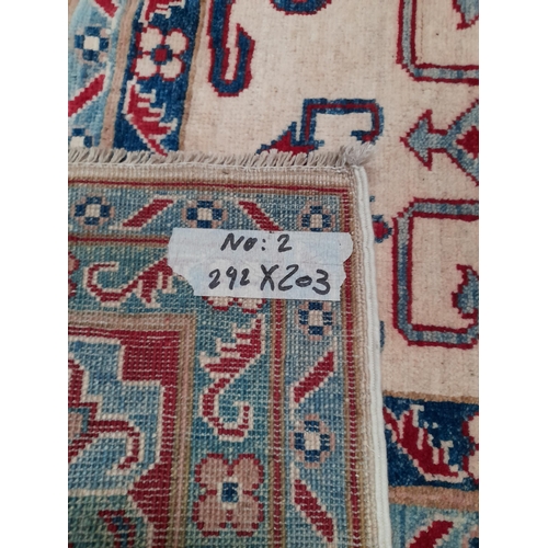 189 - AN EXCELLENT HAND-KNOTTED KAZAK RUG, hand-woven, featuring tradition Kazak pattern with multiple geo... 