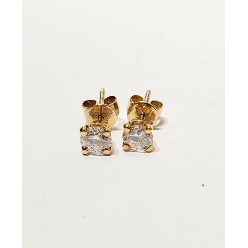 190 - A BEAUTIFUL PAIR OF 14CT YELLOW GOLD DIAMOND STUD EARRINGS, with colour of I-J & K-L, one stud 0.51c... 