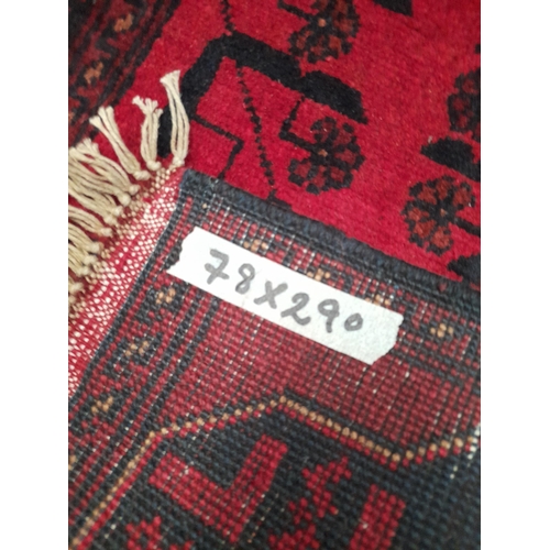 201 - A VIBRANT AFGHAN KHAN MOHAMMADI RUNNER RUG, hand-woven in the traditional Khan Mohammadi pattern in ... 