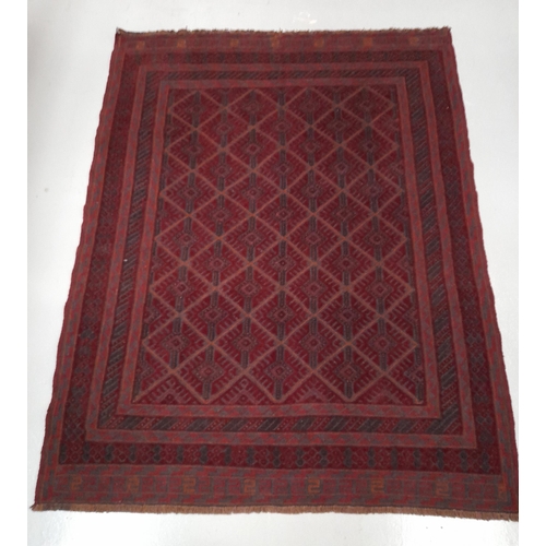 203 - A HAND-KNOTTED AFGHAN MASHWANI RUG, with central repeat geometric pattern surrounded by multiple bor... 