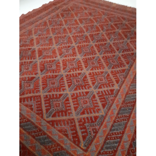 203 - A HAND-KNOTTED AFGHAN MASHWANI RUG, with central repeat geometric pattern surrounded by multiple bor... 