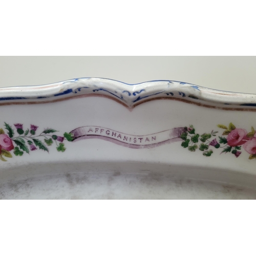 205 - A LARGE 19TH CENTURY BENGAL FUSILIERS ARMORIAL SERVING PLATTER DISH, decorated with boughs made up o... 