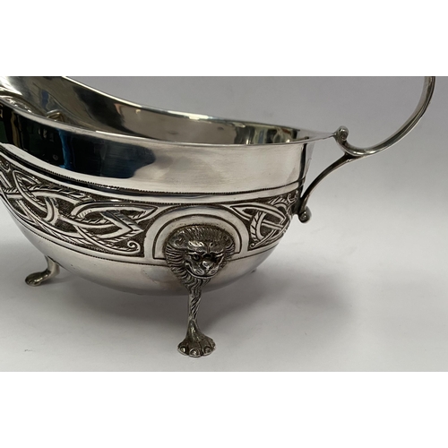 21 - A LARGE IRISH SILVER SAUCE BOAT, Hallmarked H&H (likely Hopkins & Hopkins) Dublin c.1935. Decorated ... 