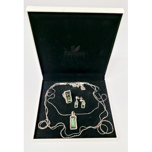 220 - A BEAUTIFUL UNO DE 50 AURORA BOREALIS SET; comprising of a pendant necklace, a pair of earrings & a ... 