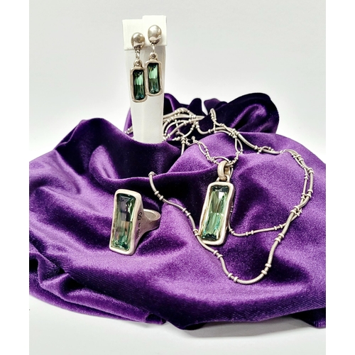 220 - A BEAUTIFUL UNO DE 50 AURORA BOREALIS SET; comprising of a pendant necklace, a pair of earrings & a ... 