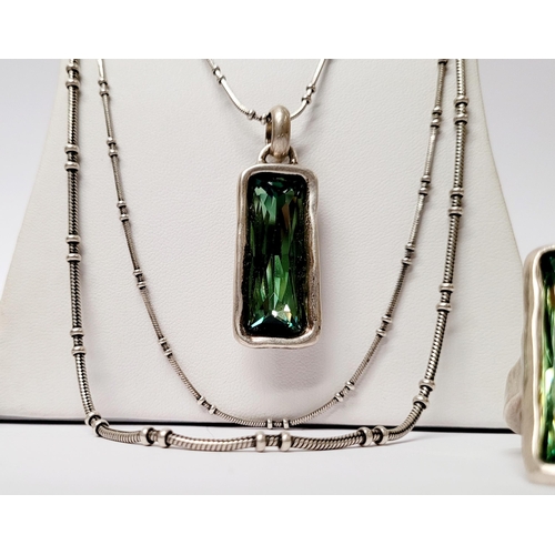 220 - A BEAUTIFUL UNO DE 50 AURORA BOREALIS SET; comprising of a pendant necklace, a pair of earrings & a ... 