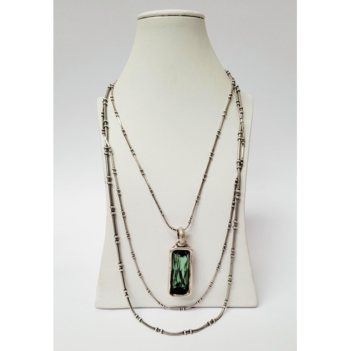 220 - A BEAUTIFUL UNO DE 50 AURORA BOREALIS SET; comprising of a pendant necklace, a pair of earrings & a ... 