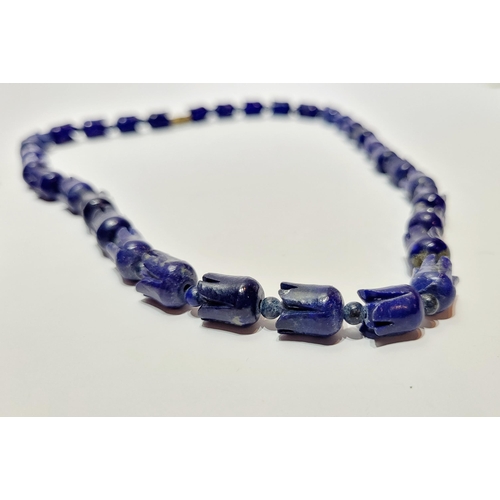 221 - A UNIQUE & BEAUTIFUL HAND CARVED LAPIS NECKLACE & EARRING SET, necklace comprising of individual car... 