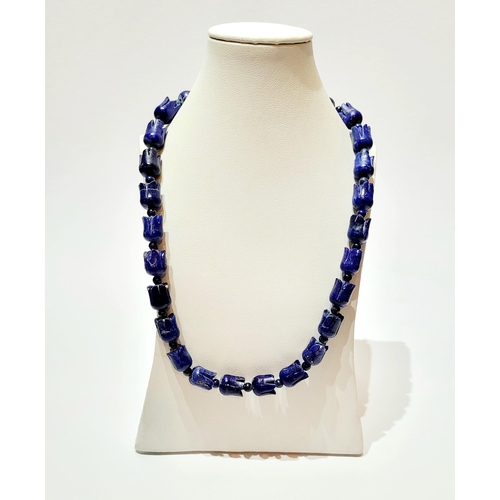 221 - A UNIQUE & BEAUTIFUL HAND CARVED LAPIS NECKLACE & EARRING SET, necklace comprising of individual car... 