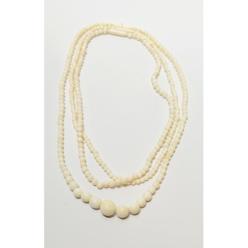 226 - A SET OF THREE BONE BEAD NECKLACES, (i) 44.5cm long open, (ii) & (iii) 37.5cm long open.