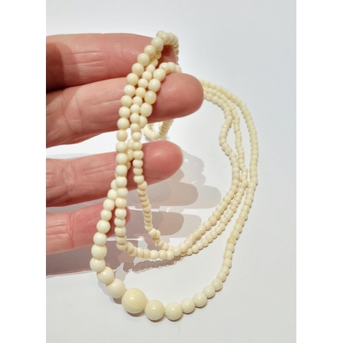 226 - A SET OF THREE BONE BEAD NECKLACES, (i) 44.5cm long open, (ii) & (iii) 37.5cm long open.