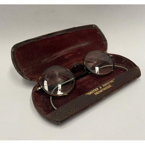 238 - A VINTAGE PAIR OF CASED GLASSES, folding glasses with round frames, the frames having two tones and ... 