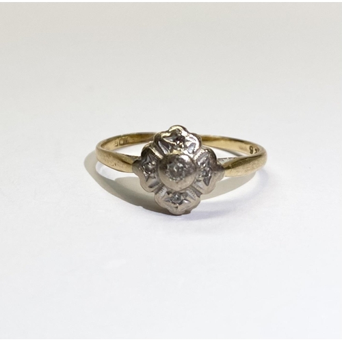 240 - AN ELEGANT 9CT YELLOW GOLD DIAMOND CLUSTER RING, with central round cut diamond surrounded by four r... 