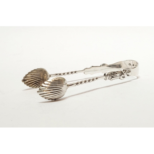 25 - A LATE 19TH CENTURY SILVER MONK SUGAR TONGS, each stem with a monk figure above a barley twist detai... 