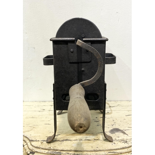 255 - A VINTAGE CAST COFFEE BEAN ROASTER, the cylinder has a sliding door which beans go in and then sit i... 